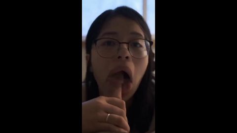 Fat lips Asian wife gorging on a hard white dick POV