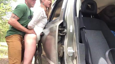 Delicate blonde's dress hiked up for fast sex against a car