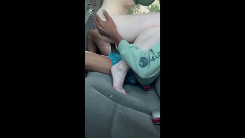 Pale teen going deep on black dick in the backseat