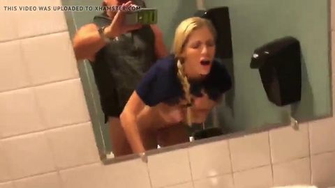 Blonde big tits nurse cheating in a public bathroom