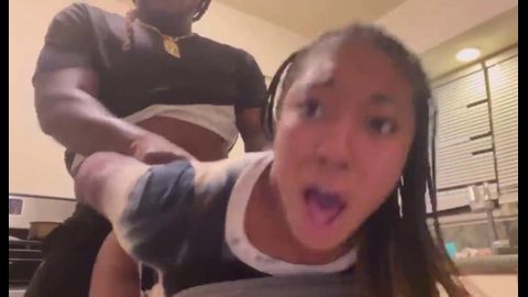 Mixed baddie with curls moaning to the camera through hard backshots